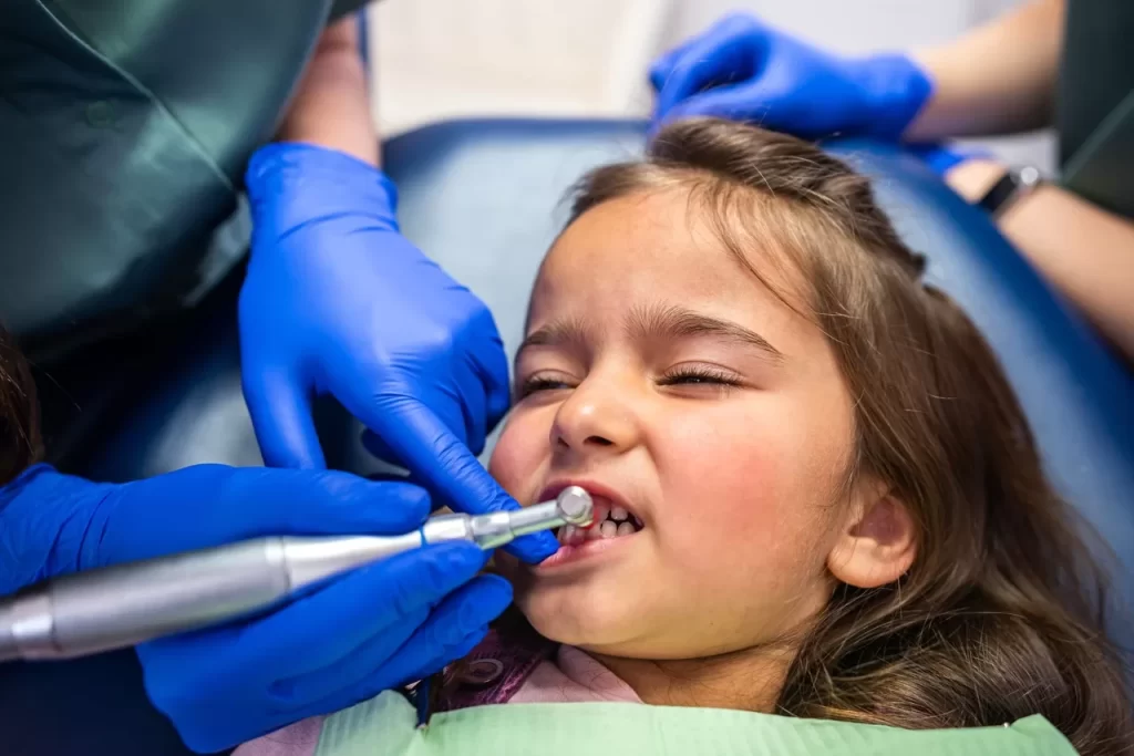 Anxious child during dental treatment
