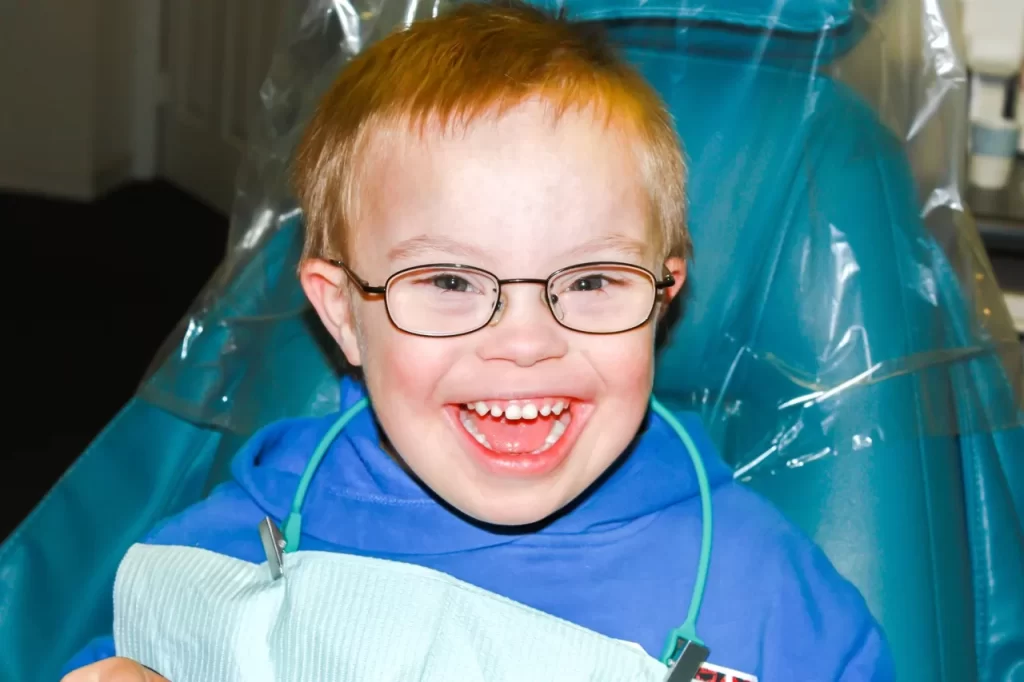 Smiling child in a pediatric dental chair