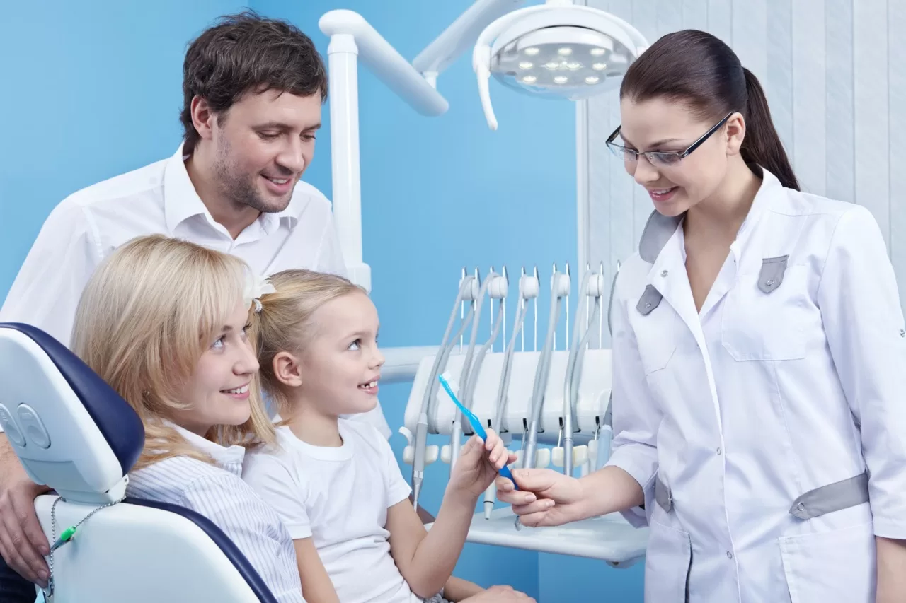 Family discussing pediatric dental care